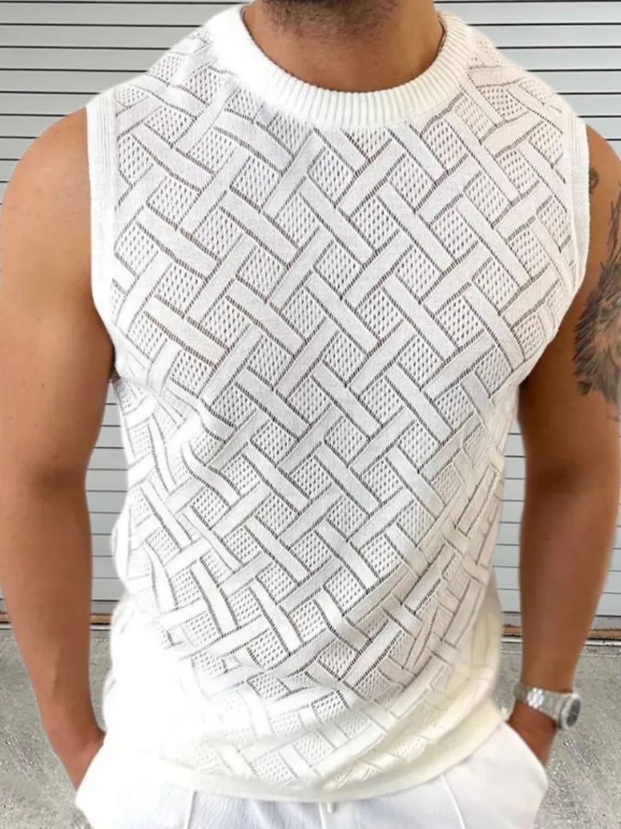 White knit sleeveless sweater with geometric pattern and crew neck.