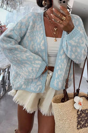 ivory cardigan featuring oversized and leopard-print
