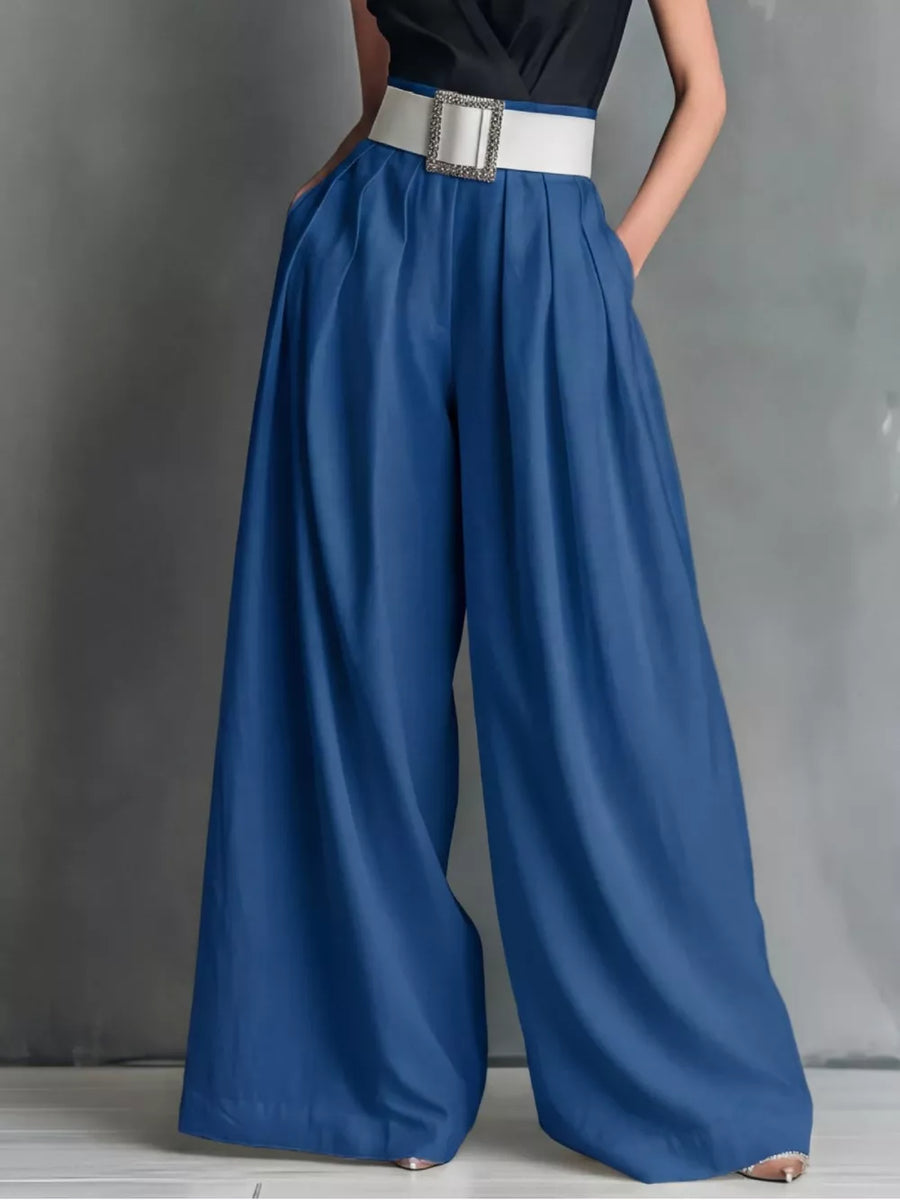 Blue belted high-waisted wide-leg maternity pants with a white buckle belt.