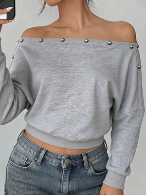 95% polyester, 5% elastane Care instructions: Machine wash cold off-shoulder top in Light Gray with relaxed silhouette