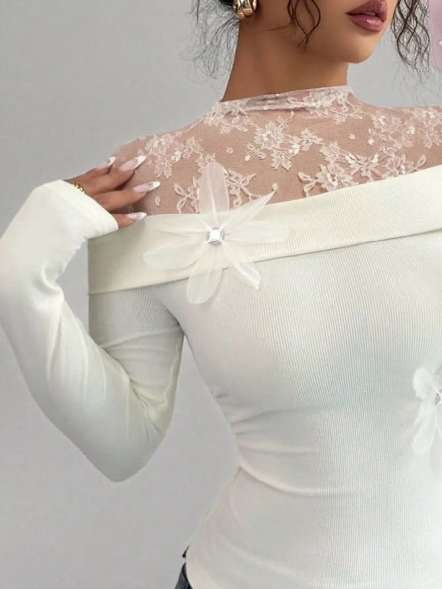 White lace detail long-sleeve bodysuit with off-the-shoulder neckline and floral embellishments.