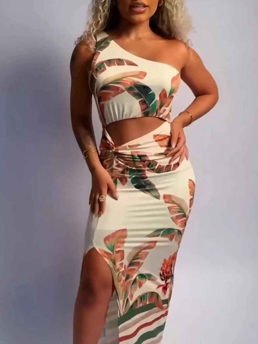 Tropical cutout maxi dress with one shoulder, side slit, and ruched detail.