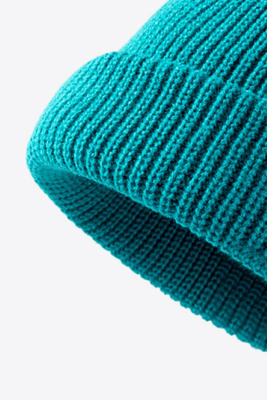 Teal ribbed knit beanie with folded edge detail