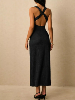 Black ribbed midi dress with crisscross back detail and open back.