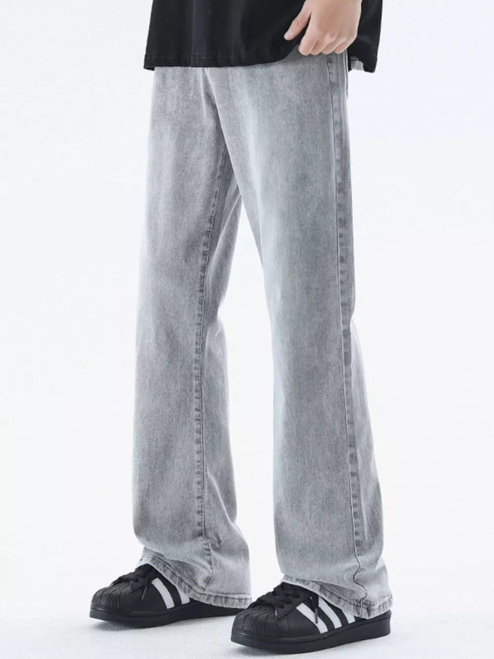 Relaxed fit light gray cotton jeans for men with a straight leg cut.