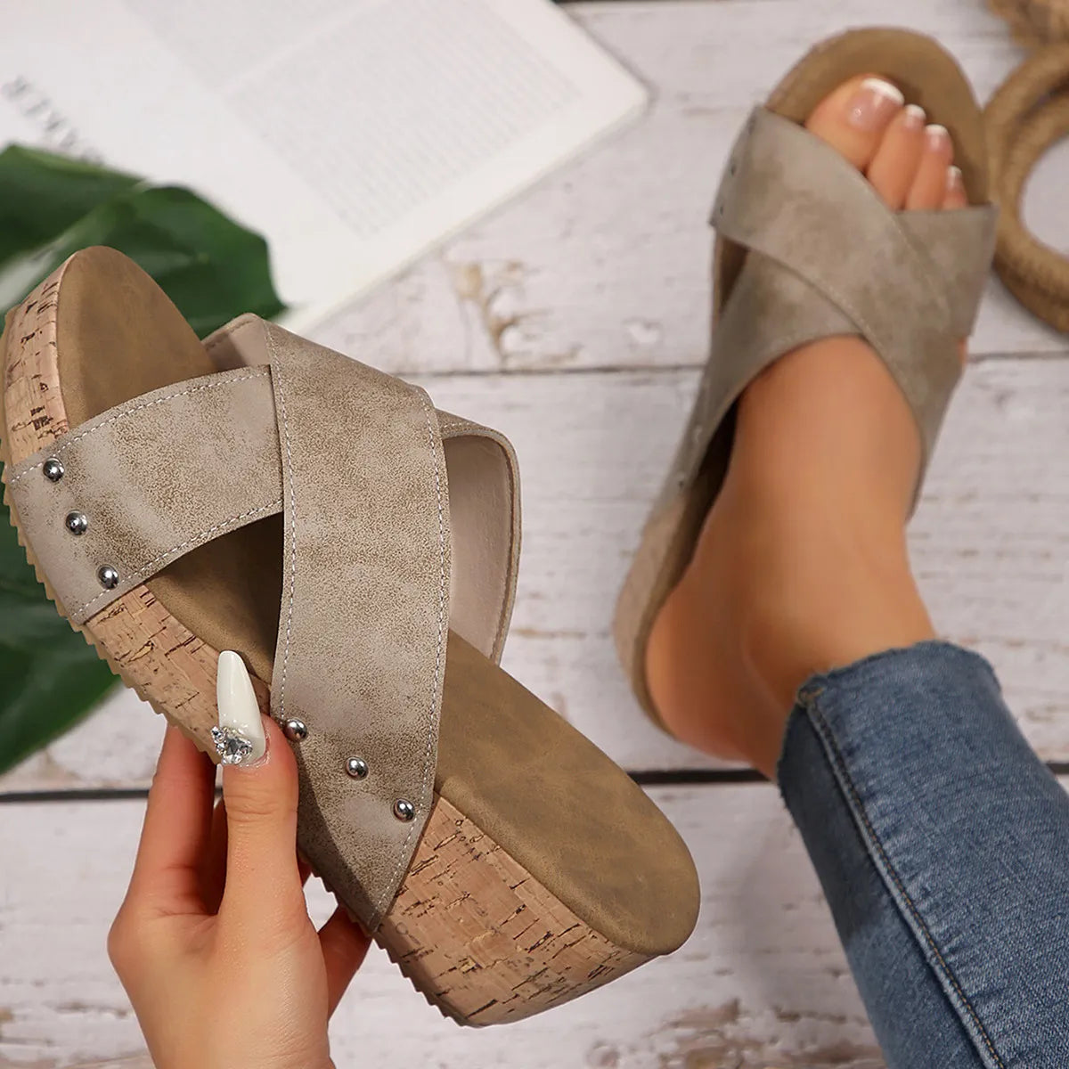 Crisscross studded cork wedge slides in Khaki with a cork wedge heel.