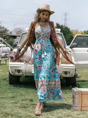 Floral tiered cami maxi dress with tassels and a V-neck in blue.