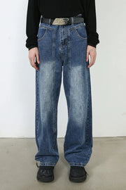 Panel seam wide leg denim jeans in medium blue wash with a relaxed fit.
