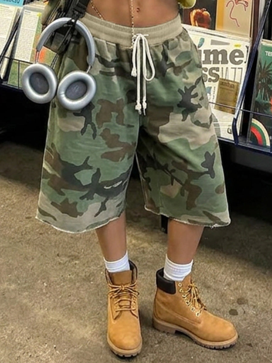 bermuda shorts in olive green featuring raw hem and relaxed fit