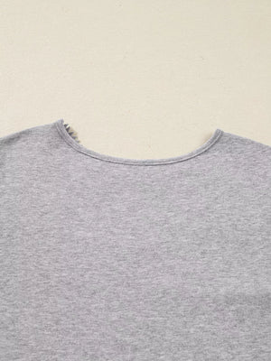 Gray ribbed knit long-sleeve top with delicate lace trim at the neckline.