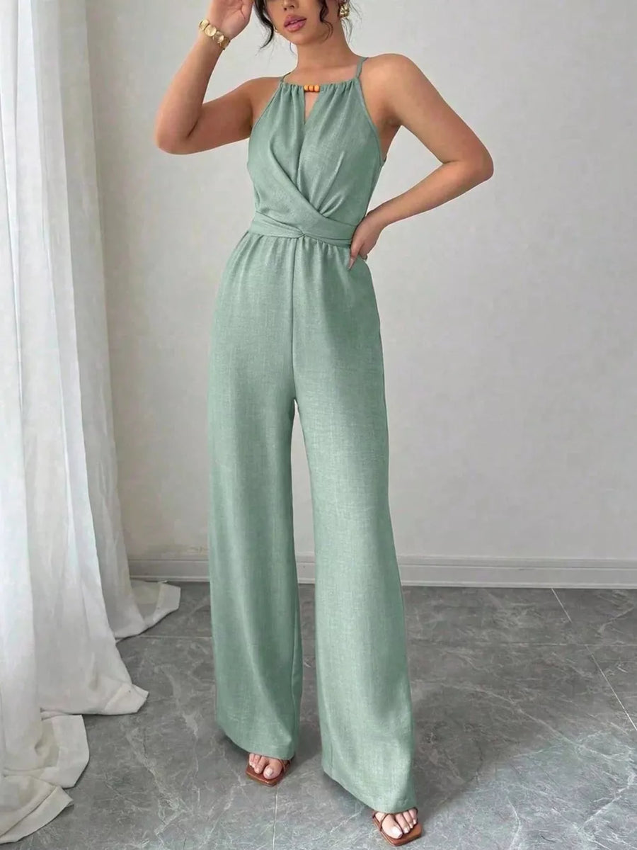 100% polyester Care instructions: Machine wash cold jumpsuit in tan with flared silhouette