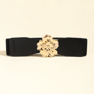 Black stretch cincher belt with gold floral buckle
