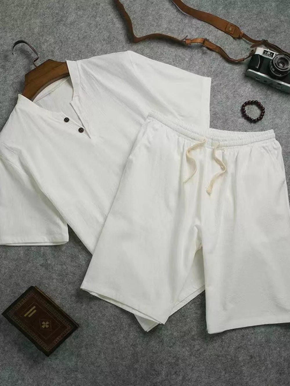 White cotton two-piece set with drawstring shorts and henley top