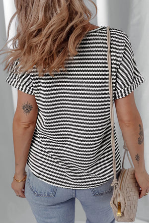 Textured knit t-shirt with black and white stripes, short sleeves, and notched neckline.