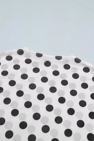 White polka dot mesh mock neck maternity shirt with sheer fabric.