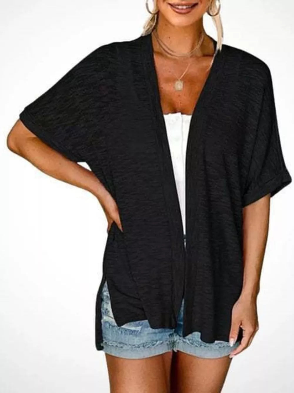 cardigan in Pastel Yellow with open front and hip-length