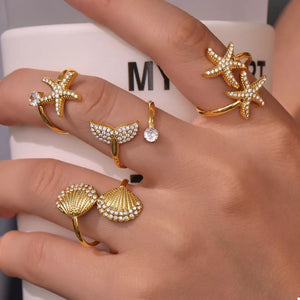ring in gold featuring starfish motif and fitted fit