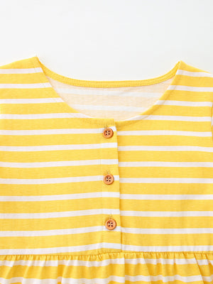 Yellow and white striped cotton toddler dress with wooden buttons and ruffled hem.