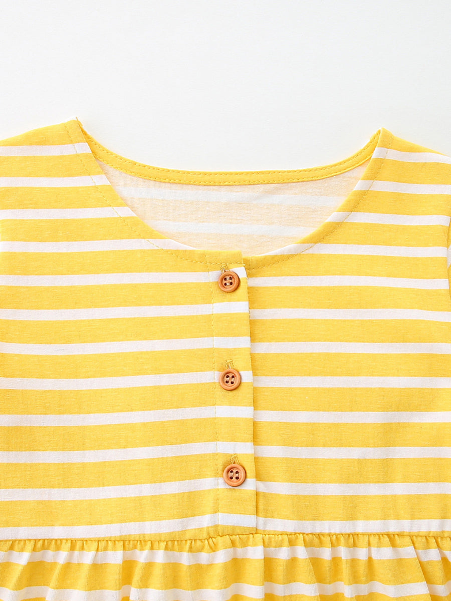 Yellow and white striped cotton toddler dress with wooden buttons and ruffled hem.