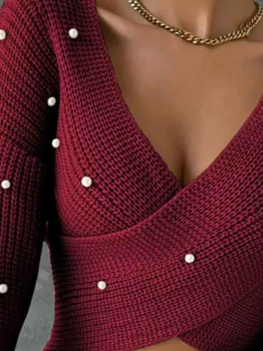 100% polyester Care instructions: Machine wash cold pullover sweater in Burgundy with fitted silhouette