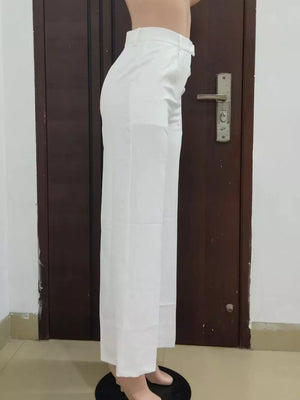 Ivory white high-waisted wide-leg trousers with a clean, tailored look.