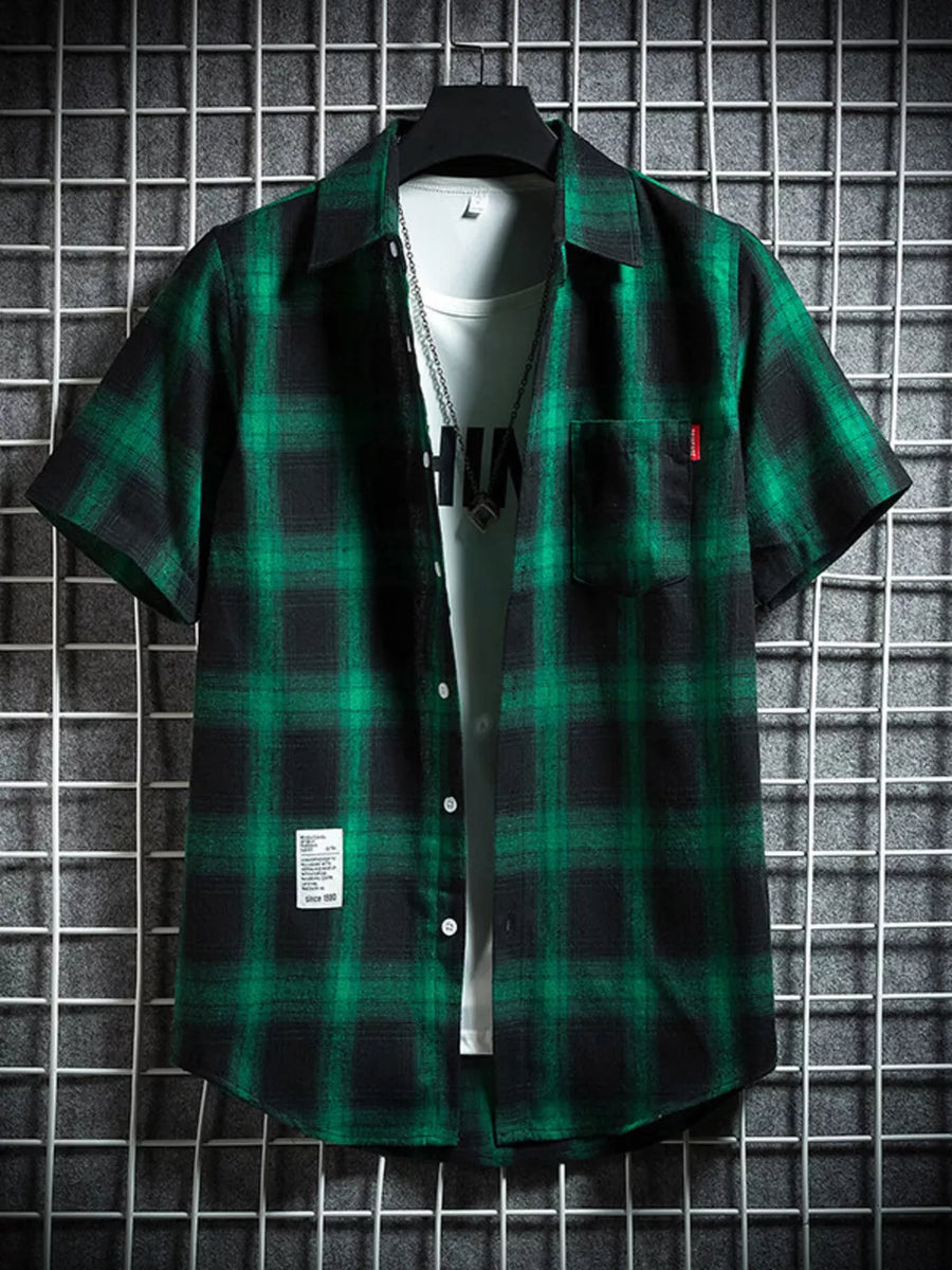 Green plaid short-sleeve cotton button-down shirt with chest pocket.