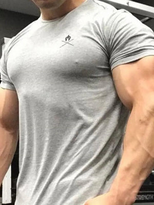 Gray activewear t-shirt with small logo detail on chest