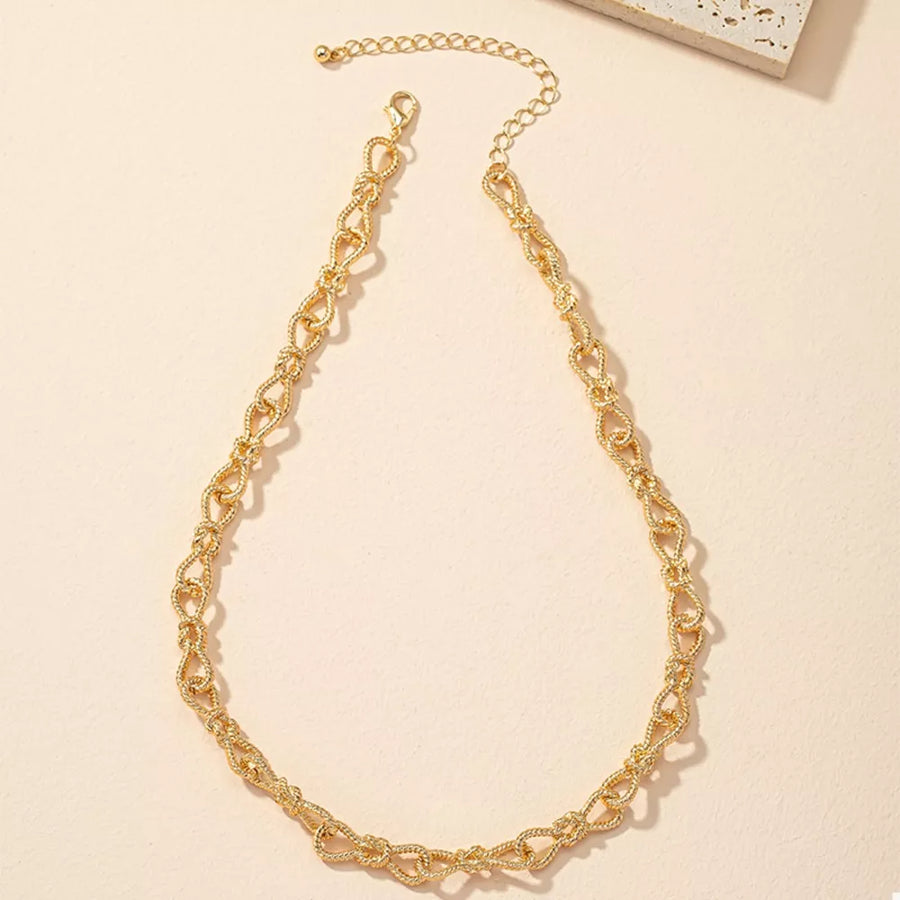 18K Gold-Plated,Alloy Care instructions: Avoid wearing during exercise, as sweat necklace in gold with chain silhouette