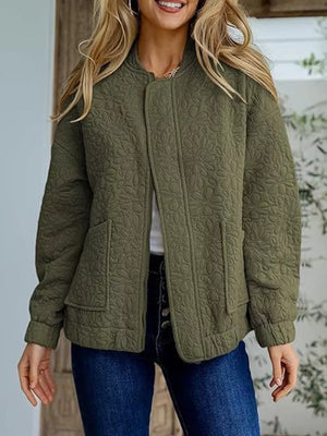 Black quilted jacket featuring quilted and floral
