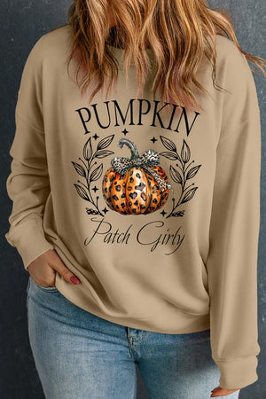 Khaki crewneck sweatshirt with pumpkin patch graphic and leopard bow detail.