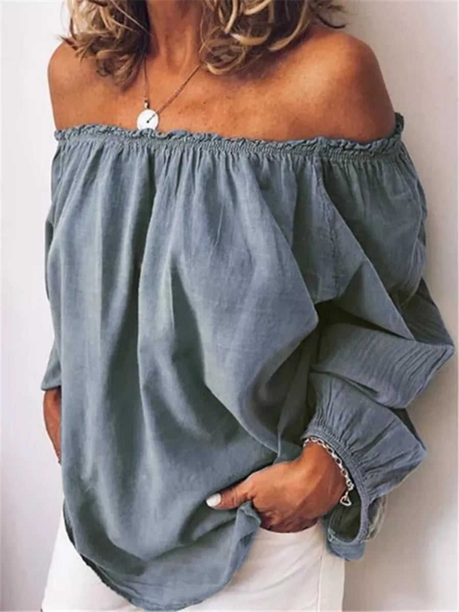 Blue off the shoulder maternity shirt with gathered neckline and frill detail.