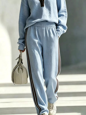 100% polyester Care instructions: Machine wash cold lounge set in Light Blue with relaxed silhouette