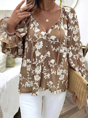 Coffee brown sheer blouse with white floral embroidery, long sleeves, and button front.