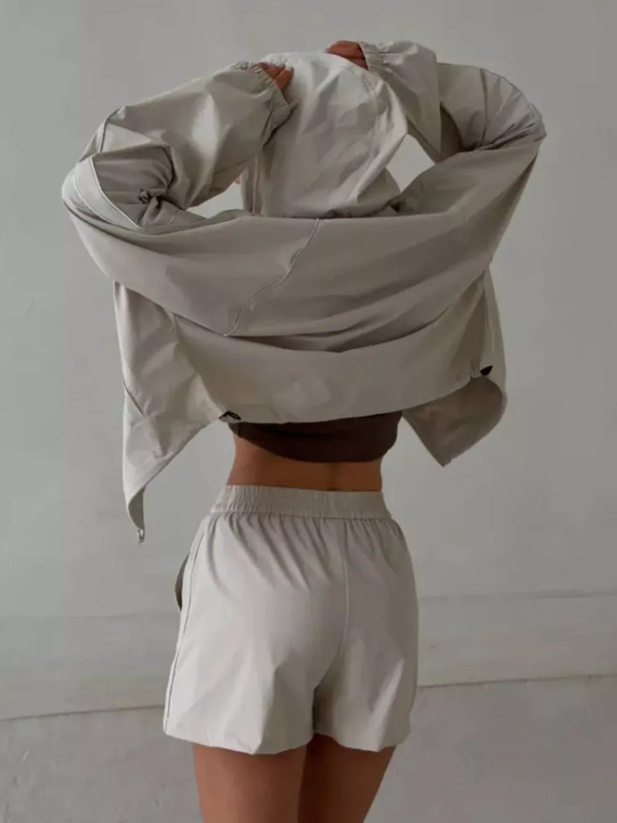Brown relaxed track jacket with mock neck