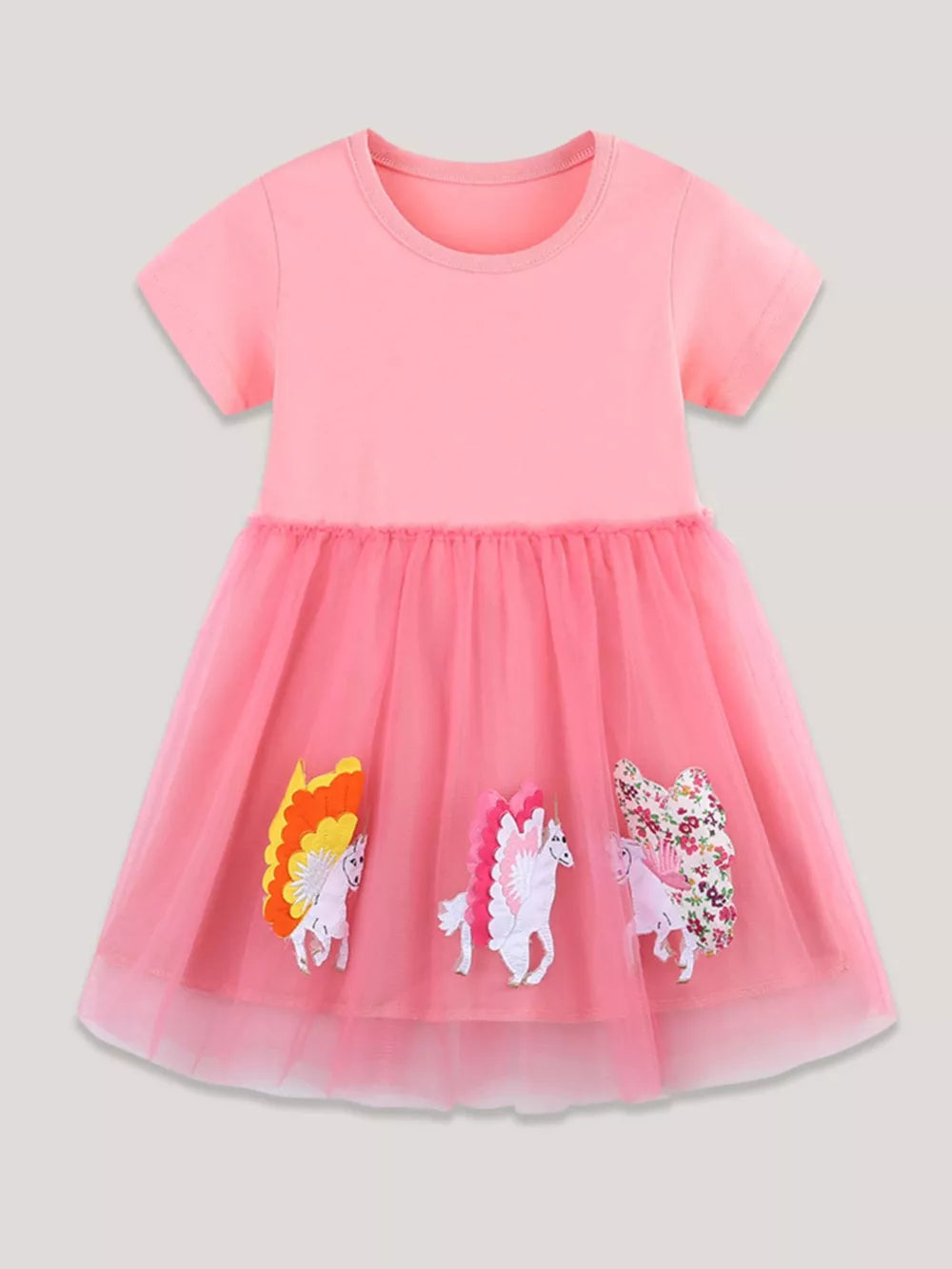 Pink cotton short sleeve dress with tulle skirt and unicorn appliques.