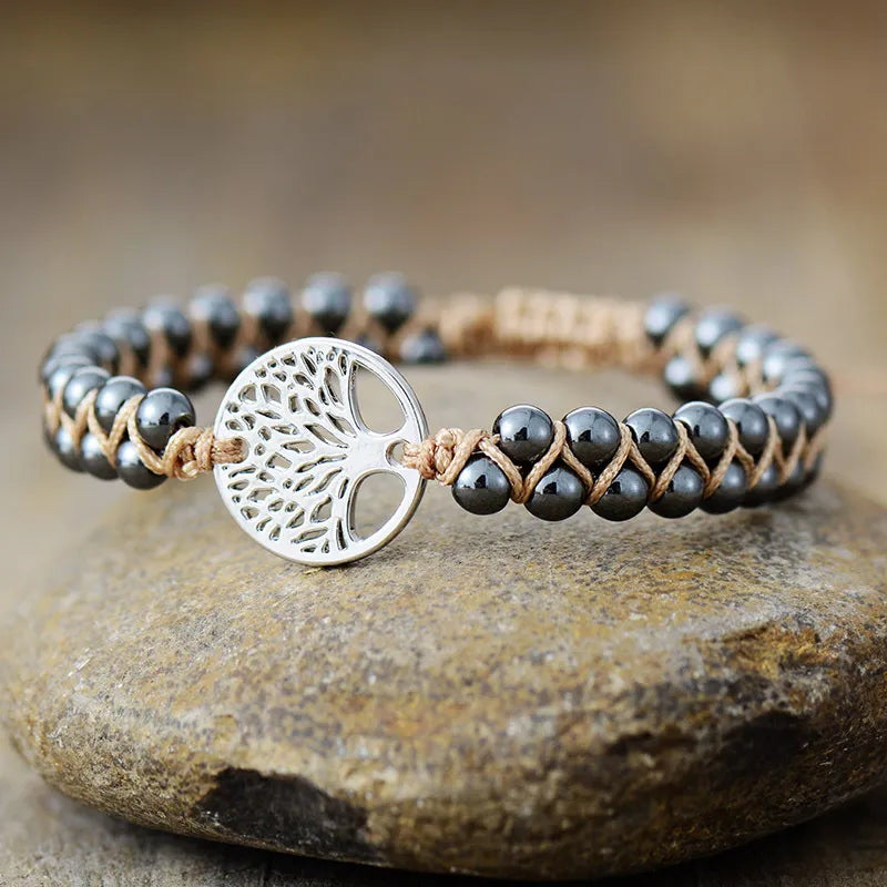 Silver Tree of Life braided bead bracelet with natural stone beads and macrame cord.