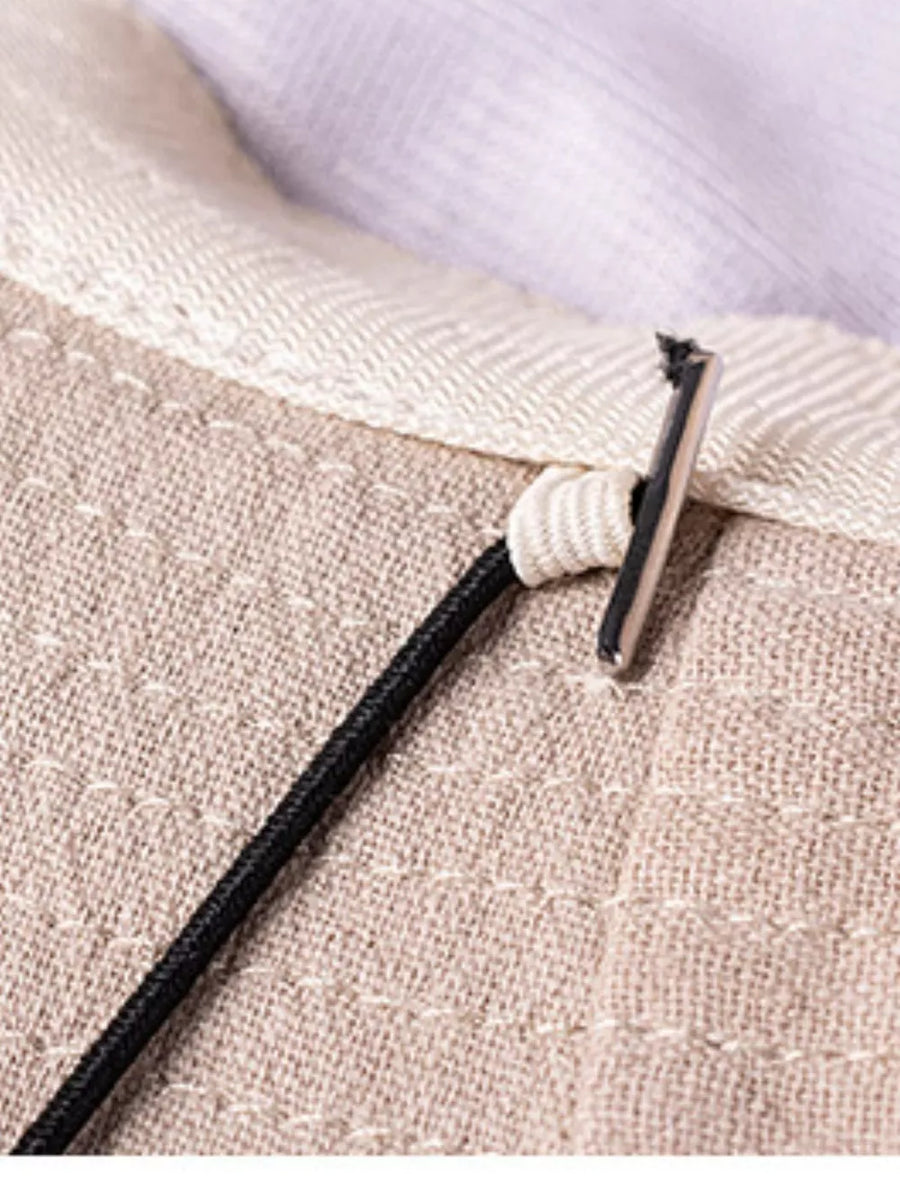 Premium cotton bucket hat detail with drawstring and brass hardware