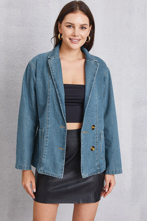 Medium denim blazer with tailored seam detailing and button closure.