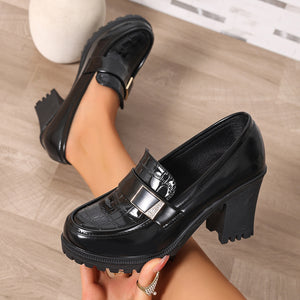 Black loafers with slip-on and crocodile-embossed
