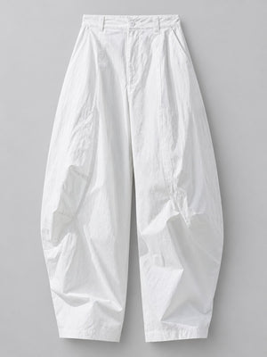 cream wide-leg pants with full-length and zipper and button