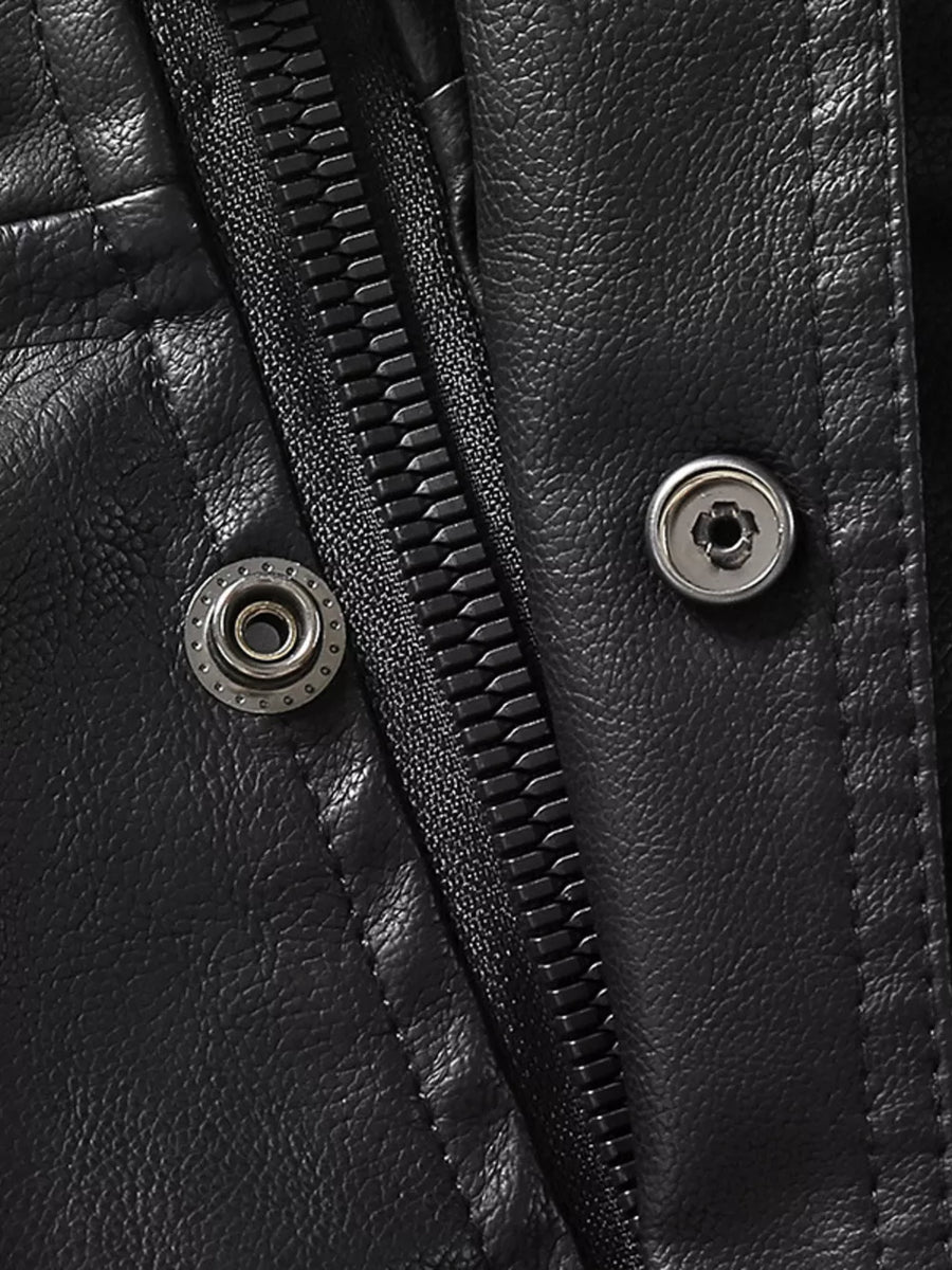 Black faux leather jacket detail with zip and snap buttons
