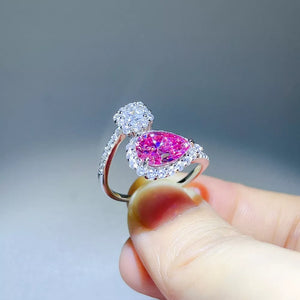 925 sterling silver,Moissanite Carat weight: 2ct Care instructions: Avoid wearin ring in fuchsia with bypass silhouette