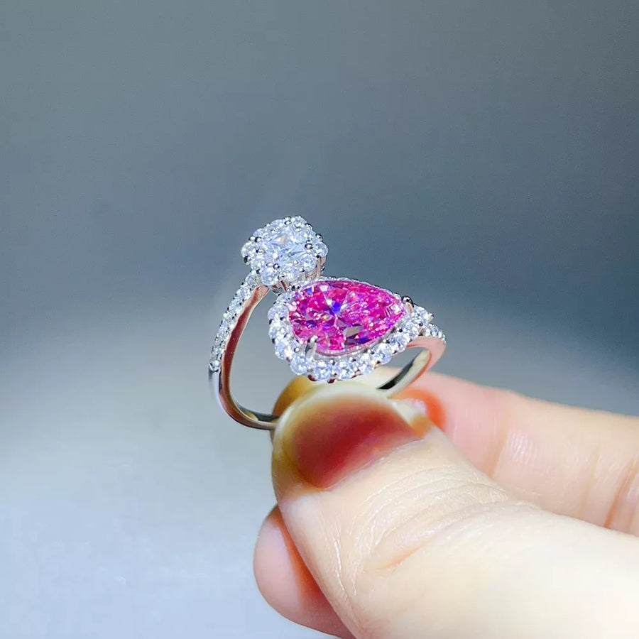 925 sterling silver,Moissanite Carat weight: 2ct Care instructions: Avoid wearin ring in fuchsia with bypass silhouette
