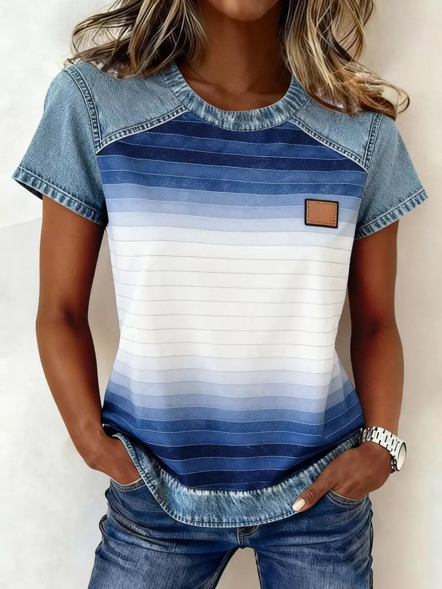 Denim patchwork blouse with ombre blue stripes and a faux leather patch.