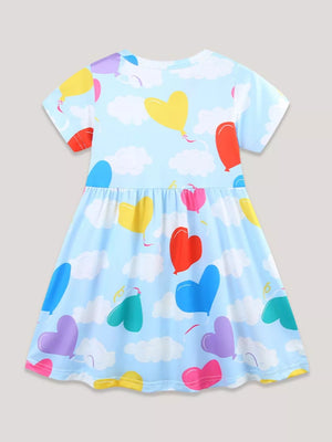 Baby & children's dress with heart balloon print on light blue sky background, short sleeves, A-line cut.