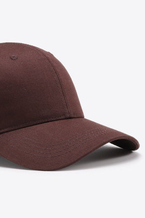 Brown cotton twill baseball cap with curved brim and stitched details.