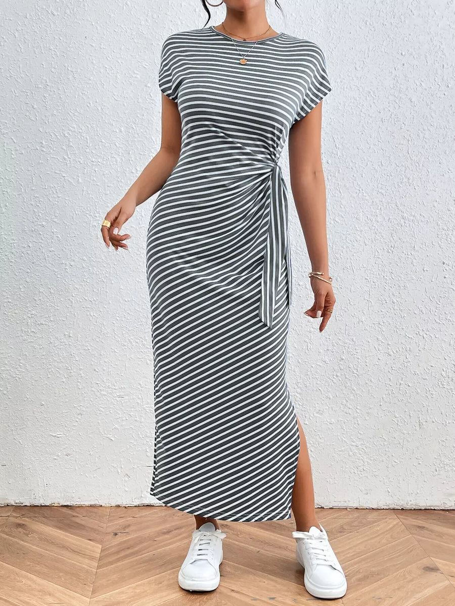 Striped midi dress with tie waist and side slit in dark gray and white.