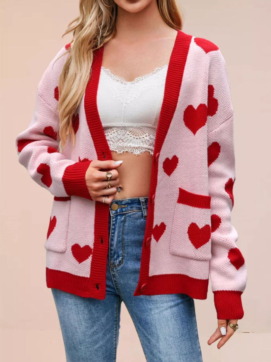 red cardigan featuring buttoned and heart-print