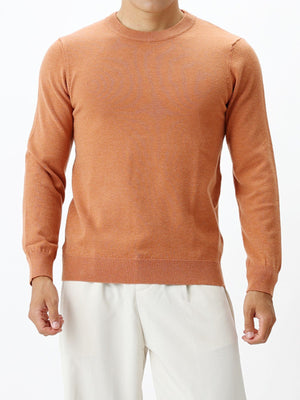 crewneck sweater in rust featuring lightweight and regular fit