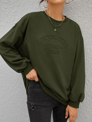 Oversized sweatshirt in Black Forest with embossed text detail and crew neck.